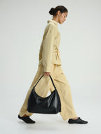Grand sac à bandoulière en cuir végétalien, déperlant, fermeture zippée, anse à nœud réglable