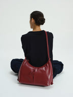 Grand sac à bandoulière en cuir végétalien, déperlant, fermeture zippée, anse à nœud réglable