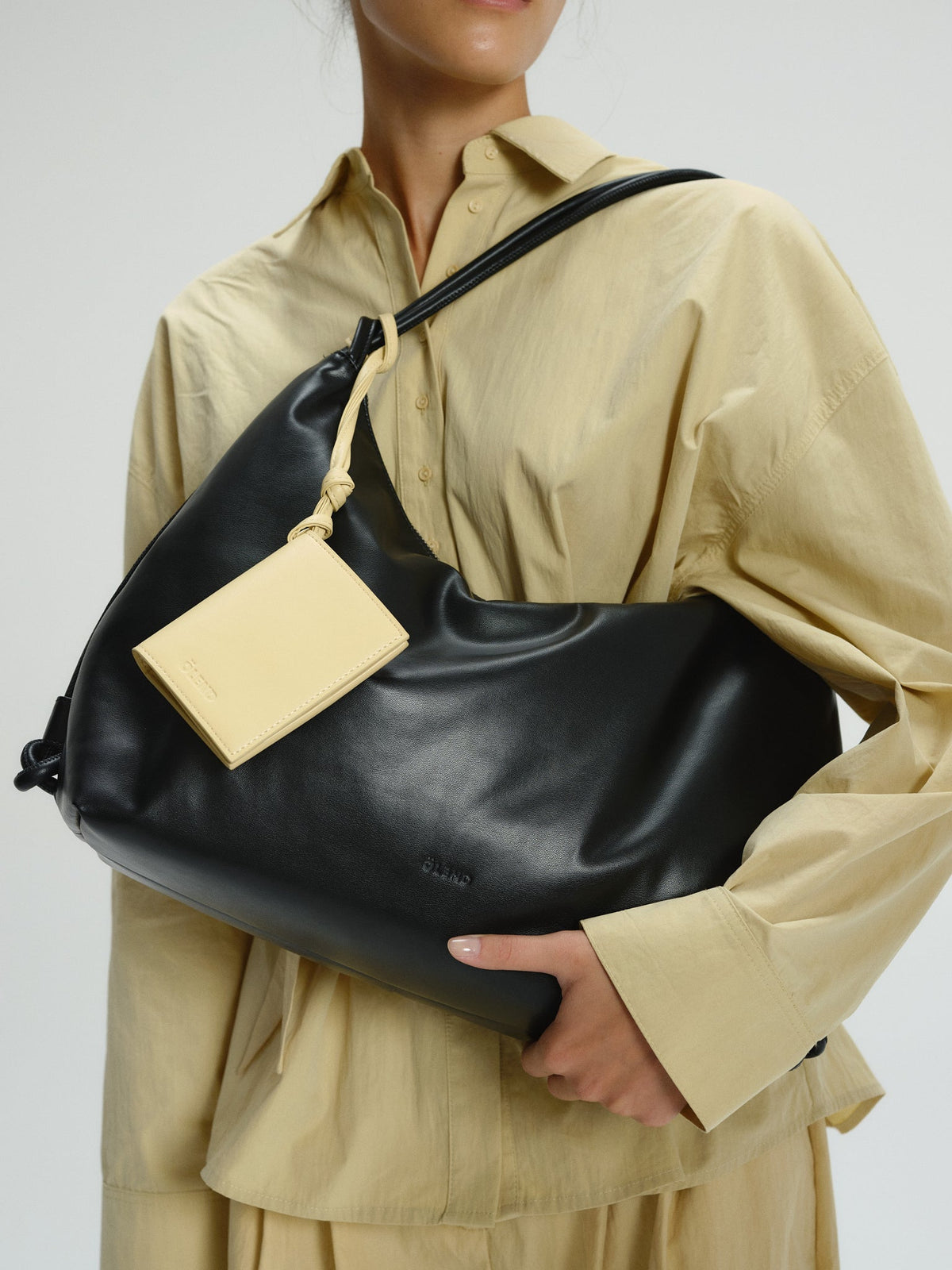 Spacious Vegan Leather Shoulder Bag, Water-Repellent, Zip Closure, Adjustable Knot Strap