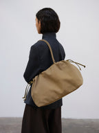 Sac Milos – Tote en cuir vegan souple, liens latéraux réglables, peut contenir votre ordinateur portable