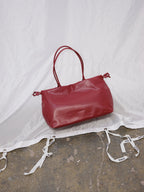 Sac Milos – Tote en cuir vegan souple, liens latéraux réglables, peut contenir votre ordinateur portable