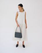 Sac Pina – Sac à bandoulière compact en cuir végétalien, lignes épurées et silhouette intemporelle