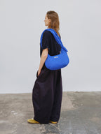 Sac Capri – Sac porté épaule matelassé, bandoulières nouées réglables, fermeture zippée
