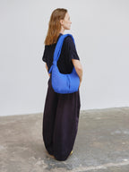 Sac Capri – Sac porté épaule matelassé, bandoulières nouées réglables, fermeture zippée