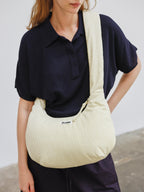 Sac Capri – Sac porté épaule matelassé, bandoulières nouées réglables, fermeture zippée