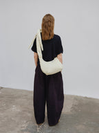 Sac Capri – Sac porté épaule matelassé, bandoulières nouées réglables, fermeture zippée