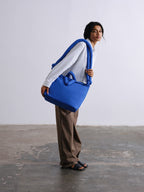 Sac rembourré 100 % nylon recyclé, fermeture zippée, compartiment pour ordinateur portable et tablette