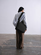 Sac rembourré 100 % nylon recyclé, fermeture zippée, compartiment pour ordinateur portable et tablette