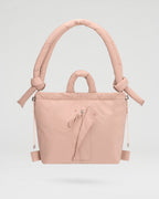Sac matelassé inspiré de l'imperméable, deux grandes poches, sac à main, porté croisé ou sac à dos