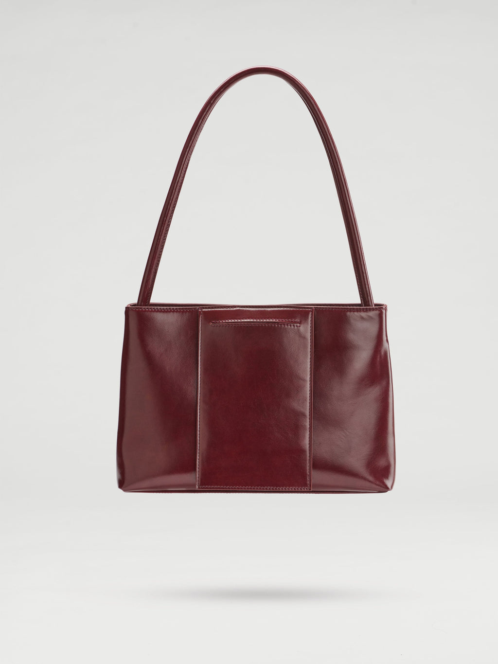 Sac Pina – Sac à bandoulière compact en cuir végétalien, lignes épurées et silhouette intemporelle