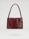 Sac Pina – Sac à bandoulière compact en cuir végétalien, lignes épurées et silhouette intemporelle