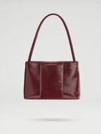 Sac Pina – Sac à bandoulière compact en cuir végétalien, lignes épurées et silhouette intemporelle
