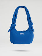 Sac Capri – Sac porté épaule matelassé, bandoulières nouées réglables, fermeture zippée