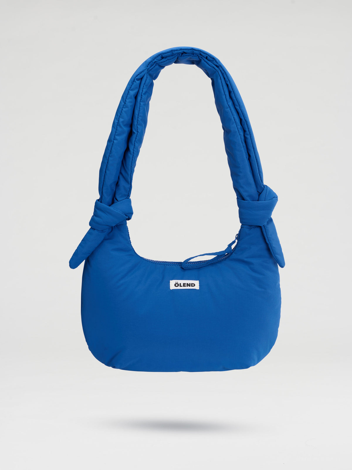 Sac Capri – Sac porté épaule matelassé, bandoulières nouées réglables, fermeture zippée