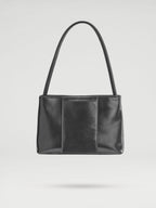 Sac Pina – Sac à bandoulière compact en cuir végétalien, lignes épurées et silhouette intemporelle