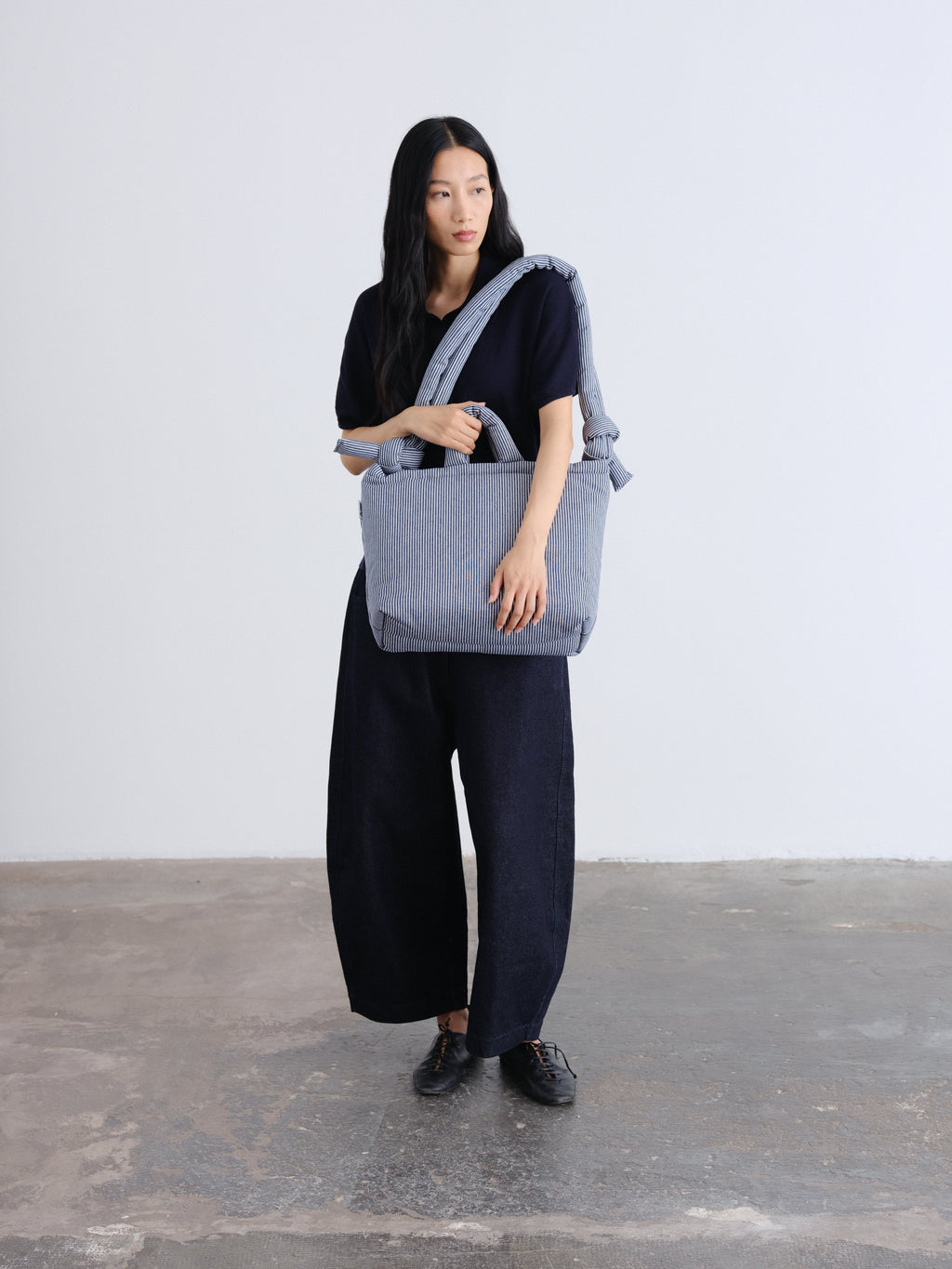 Sac rembourré 100 % nylon recyclé, fermeture zippée, compartiment pour ordinateur portable et tablette