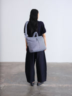 Sac rembourré 100 % nylon recyclé, fermeture zippée, compartiment pour ordinateur portable et tablette