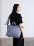 Sac rembourré 100 % nylon recyclé, fermeture zippée, compartiment pour ordinateur portable et tablette