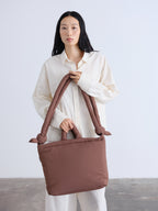 Sac rembourré 100 % nylon recyclé, fermeture zippée, compartiment pour ordinateur portable et tablette