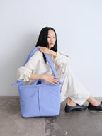 Sac rembourré 100 % nylon recyclé, fermeture zippée, compartiment pour ordinateur portable et tablette