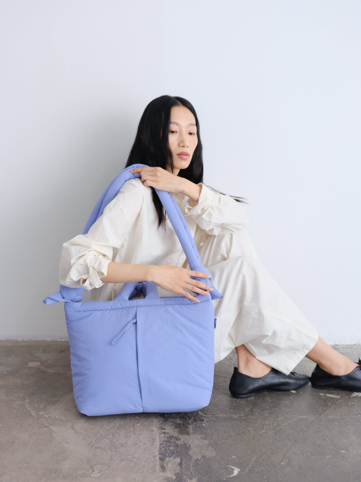 Sac rembourré 100 % nylon recyclé, fermeture zippée, compartiment pour ordinateur portable et tablette