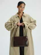 Sac Pina – Sac à bandoulière compact en cuir végétalien, lignes épurées et silhouette intemporelle