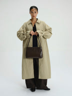 Sac Pina – Sac à bandoulière compact en cuir végétalien, lignes épurées et silhouette intemporelle