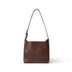 Sac hobo noir à épaule, boucle dorée, aspect cuir lisse