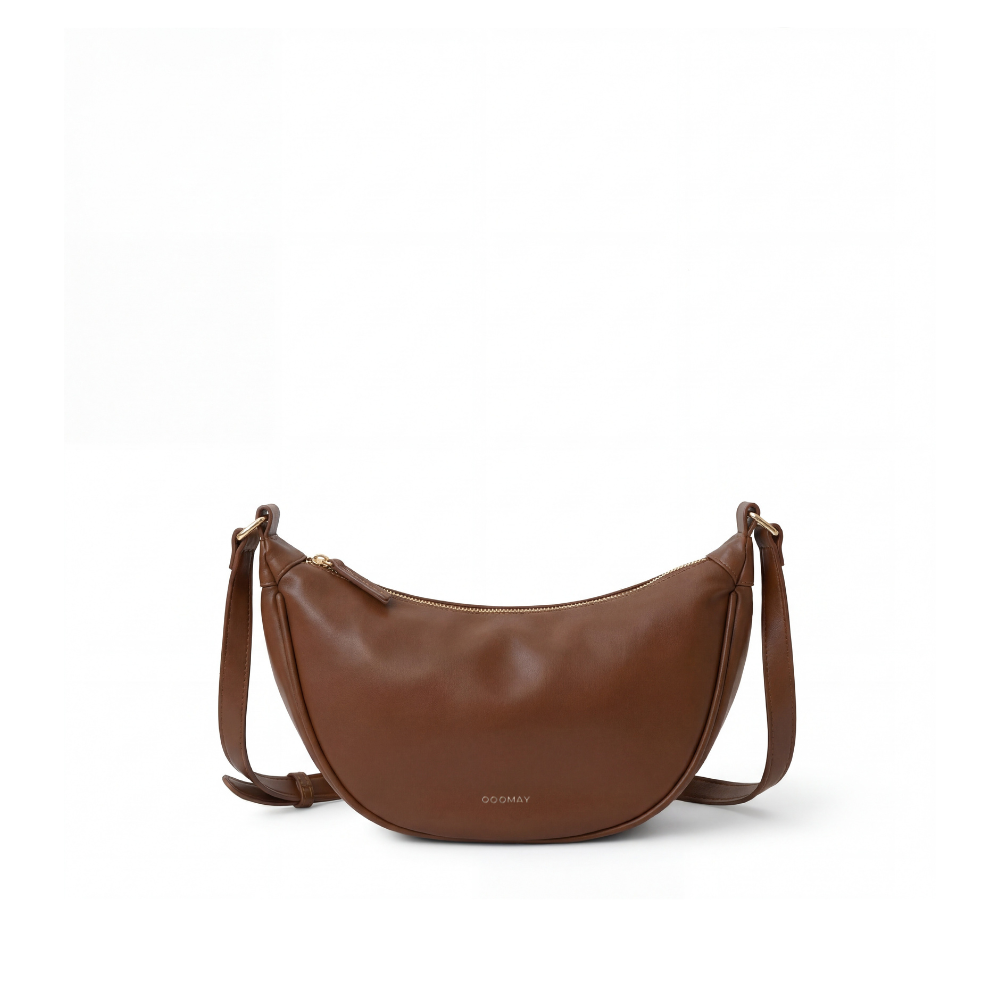 Sac bandoulière croissant noir, aspect cuir lisse