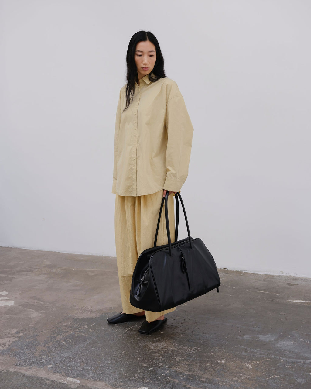 Sac de voyage format cabine en cuir vegan premium, déperlant et résistant aux rayures
