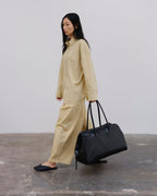 Sac de voyage format cabine en cuir vegan premium, déperlant et résistant aux rayures