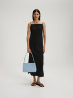 Sac Pina – Sac à bandoulière compact en cuir végétalien, lignes épurées et silhouette intemporelle