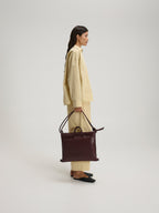 Sac pliable – Sac polyvalent en cuir végétalien, porté en cabas, en bandoulière ou en sac à dos